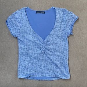 ALMOST NEW. Blue and white Brandy Melville top.